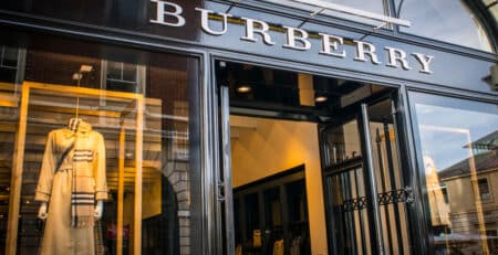 Image of Burberry Nova Check scarf and famous trench coat.