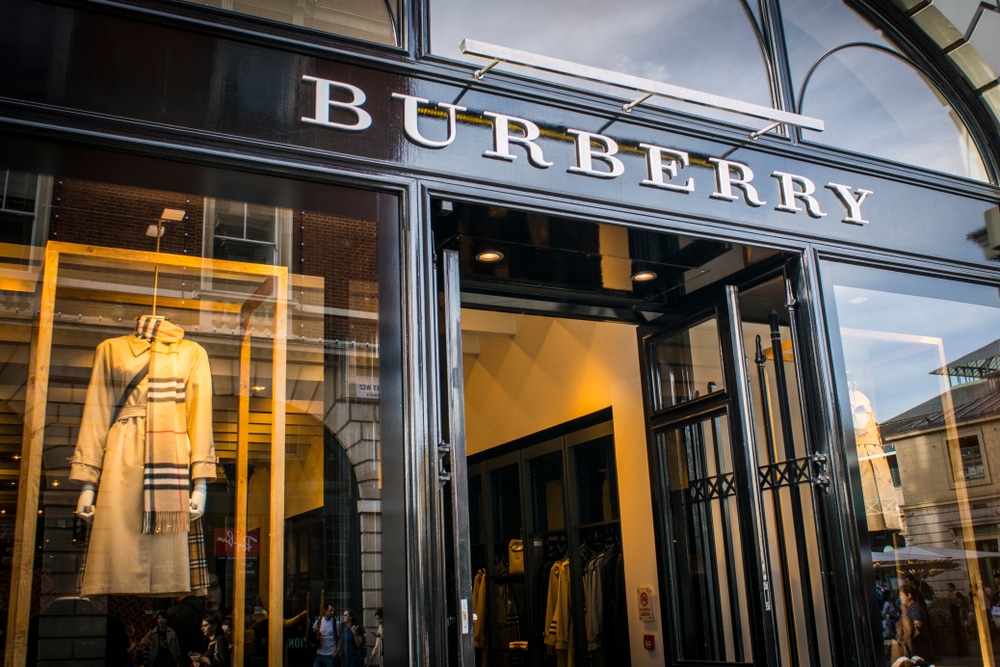 Image of Burberry Nova Check scarf and famous trench coat.